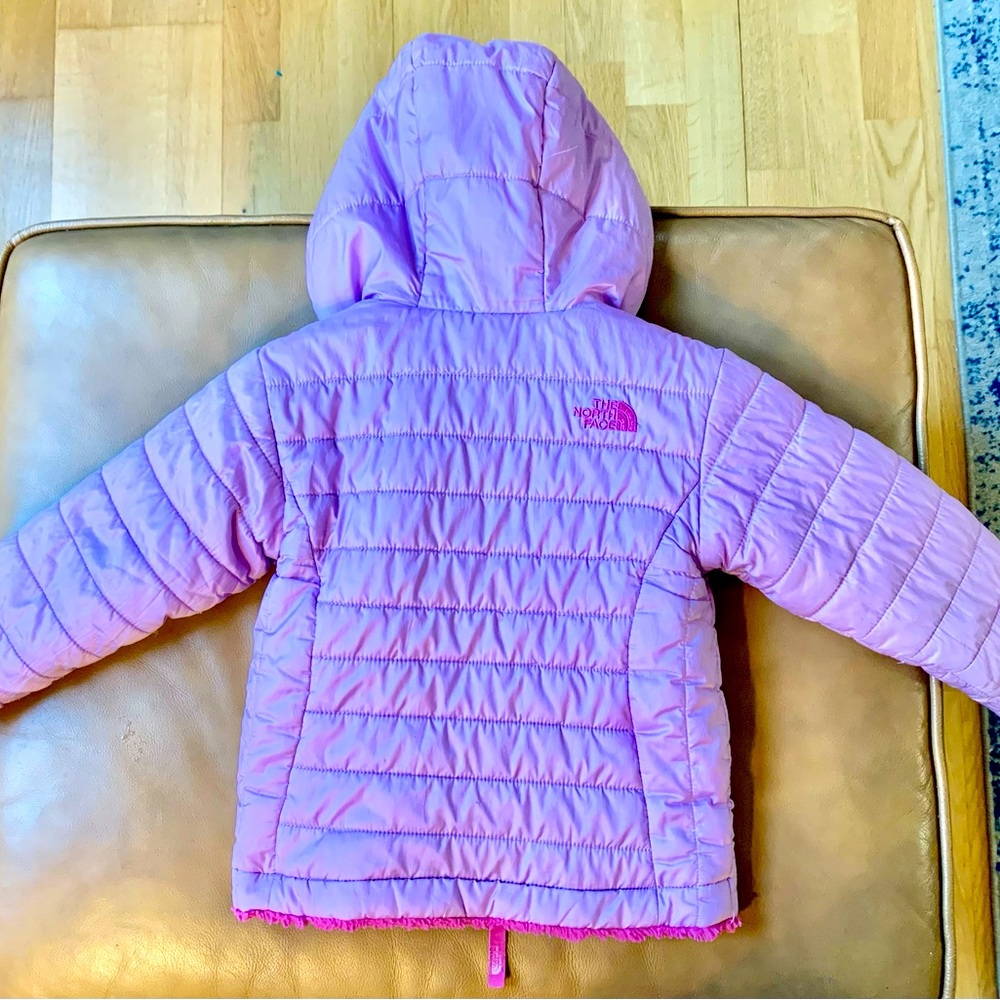Well loved purple North Face winter coat.